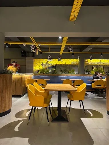 Interior view of Cheezious restaurant