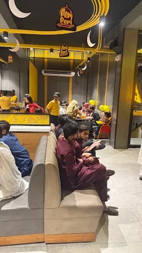 Interior view of Cheezious restaurant
